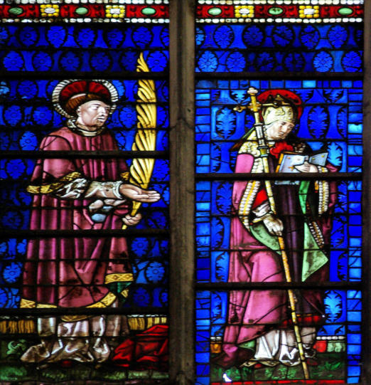 Saint Etienne présente le donateur (réduit à sa tunique rouge) et Saint Claude